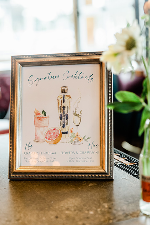  whimsical wedding at an ocean front venue with the groom in a mix and match look with navy and grey colors – drinks menu