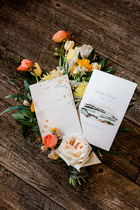  whimsical wedding at an ocean front venue with the groom in a mix and match look with navy and grey colors – invitations 