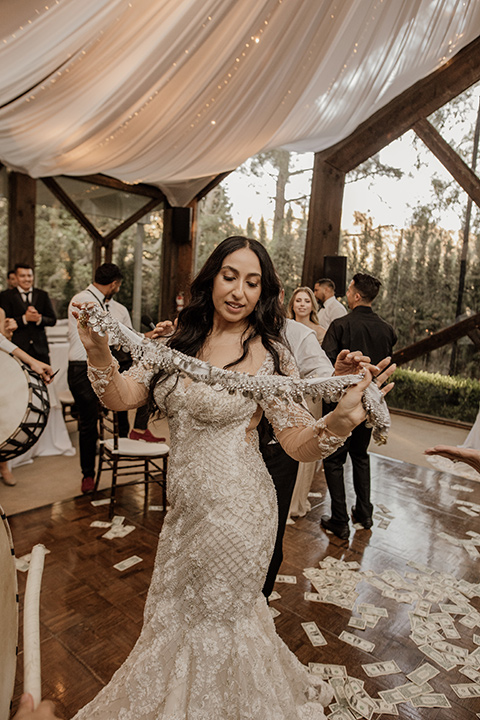  black and blush wedding with drums and star décor – bride celebrating