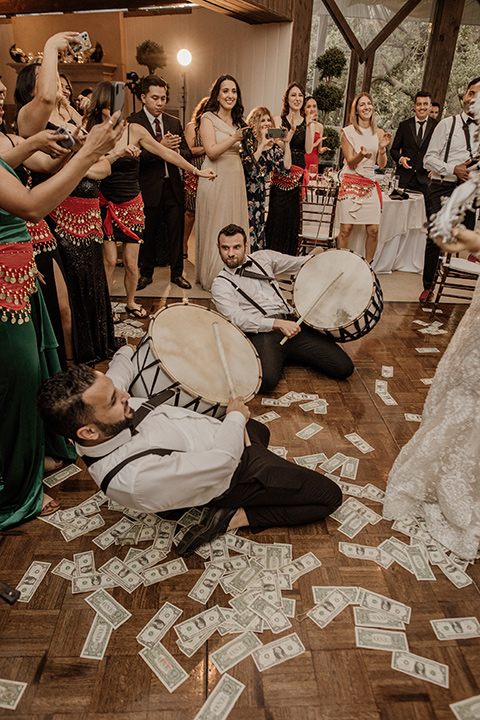  black and blush wedding with drums and star décor –groom celebrating