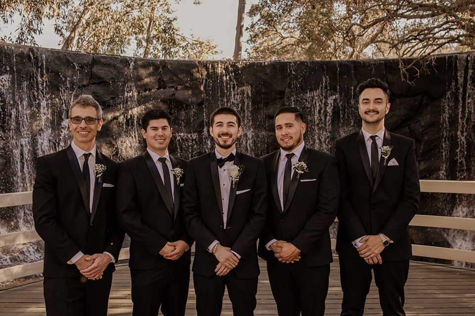  black and blush wedding with drums and star décor – groomsmen
