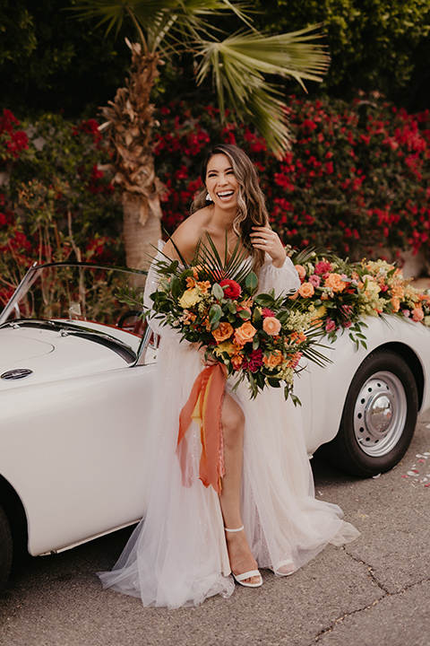  a funky groovy downtown palm springs wedding with bright colors and boho style - bride 