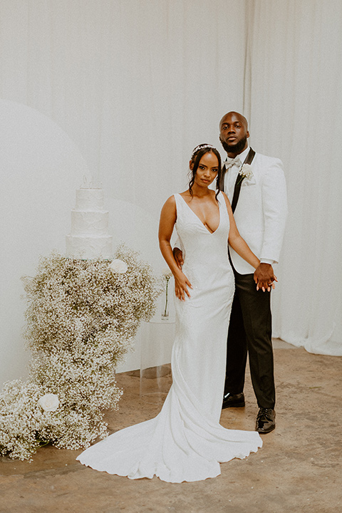  white and black wedding at the East Angel in LA – couple embracing