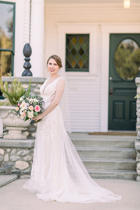  a romantic garden wedding with grey and pink décor and style, with the bride in a gorgeous white gown and the groom in a heather grey suit, the bridesmaids were in blush pink gowns and the groomsmen in heather grey suits - bride