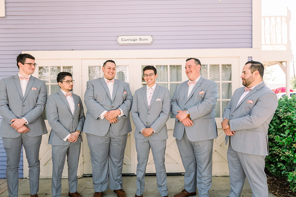  a romantic garden wedding with grey and pink décor and style, with the bride in a gorgeous white gown and the groom in a heather grey suit, the bridesmaids were in blush pink gowns and the groomsmen in heather grey suits – groomsmen