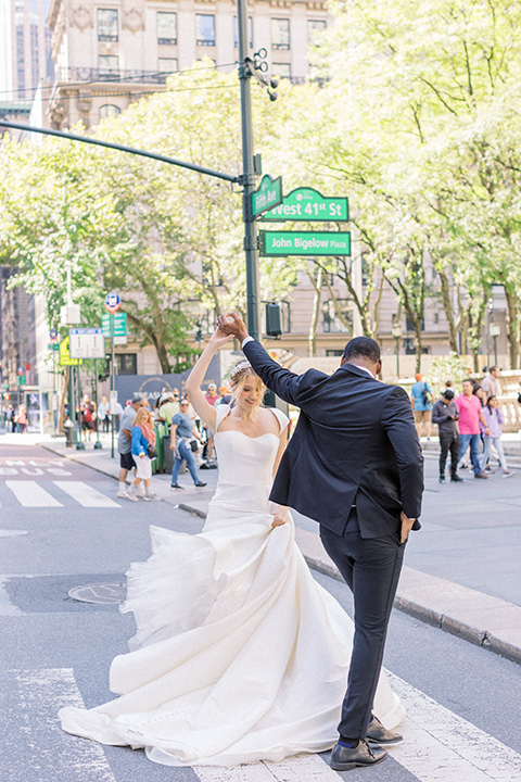  A dramatic modern black and white wedding in Central Park New York City - walking in the street 