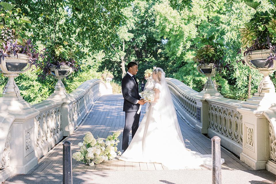  A dramatic modern black and white wedding in Central Park New York City – couple on the bridge
