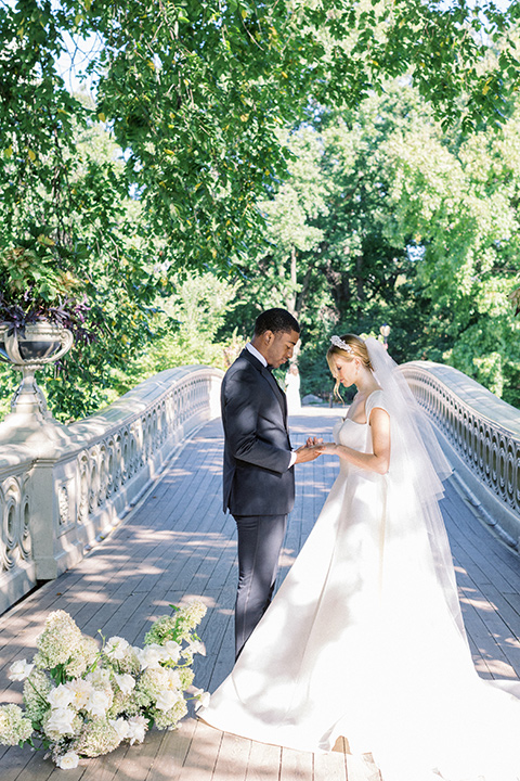  A dramatic modern black and white wedding in Central Park New York City - on the bridge 