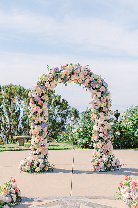  feminine spring editorial at a villa and the groom in a steel blue suit – ceremony decor 