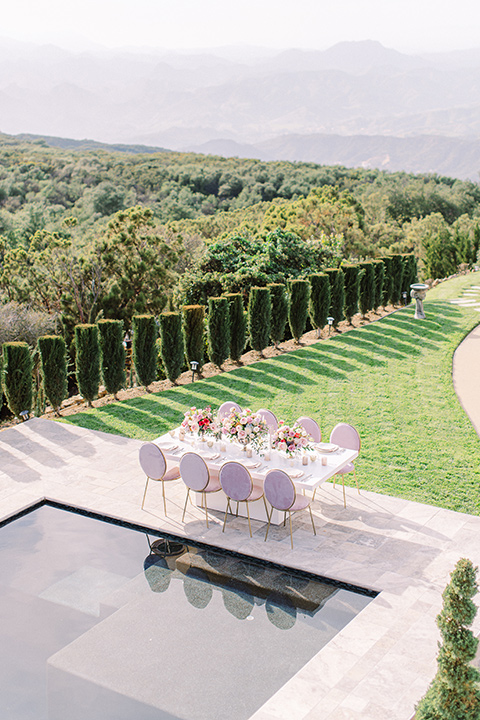  feminine spring editorial at a villa and the groom in a steel blue suit – tables 