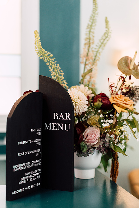  fig house shoot with burgundy and yellow details and the groom in a burgundy tuxedo – bar menu 