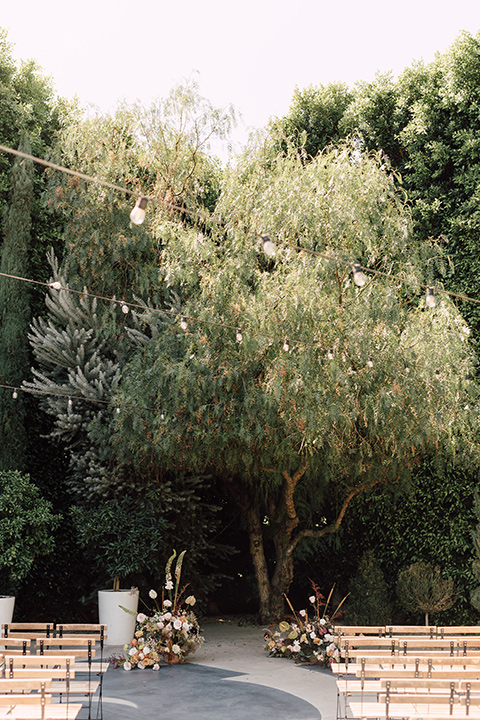  fig house shoot with burgundy and yellow details and the groom in a burgundy tuxedo – ceremony décor 