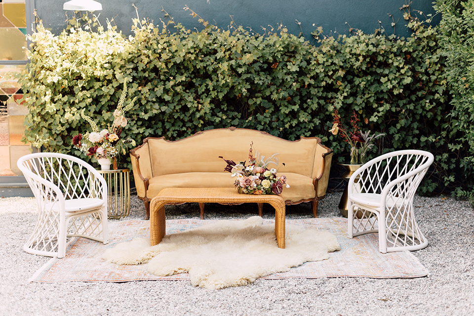  fig house shoot with burgundy and yellow details and the groom in a burgundy tuxedo – furniture 