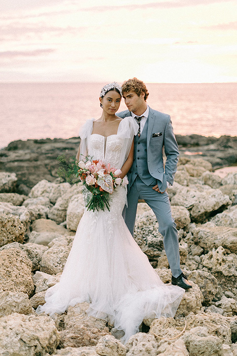  tropical tan and berry colored wedding in Hawaii – couple rocks 