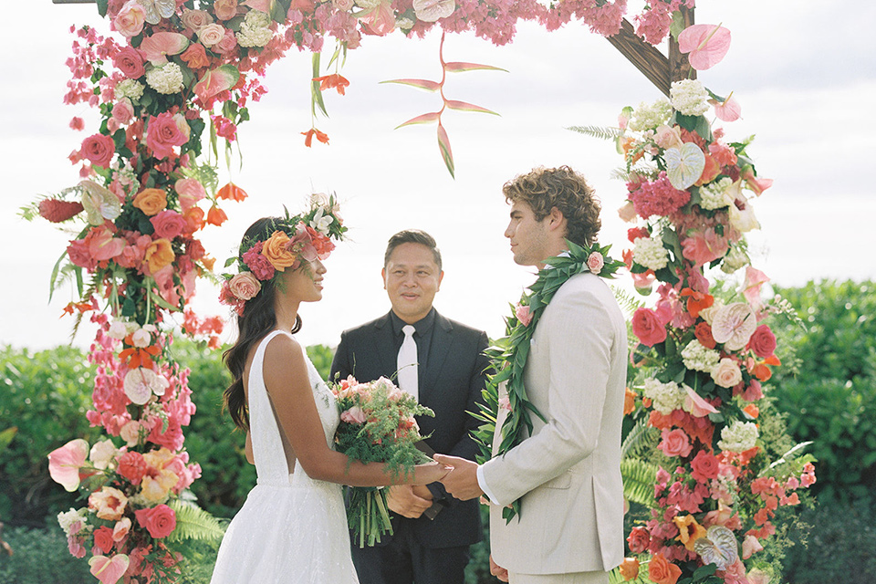  tropical tan and berry colored wedding in Hawaii – couple and the vows 