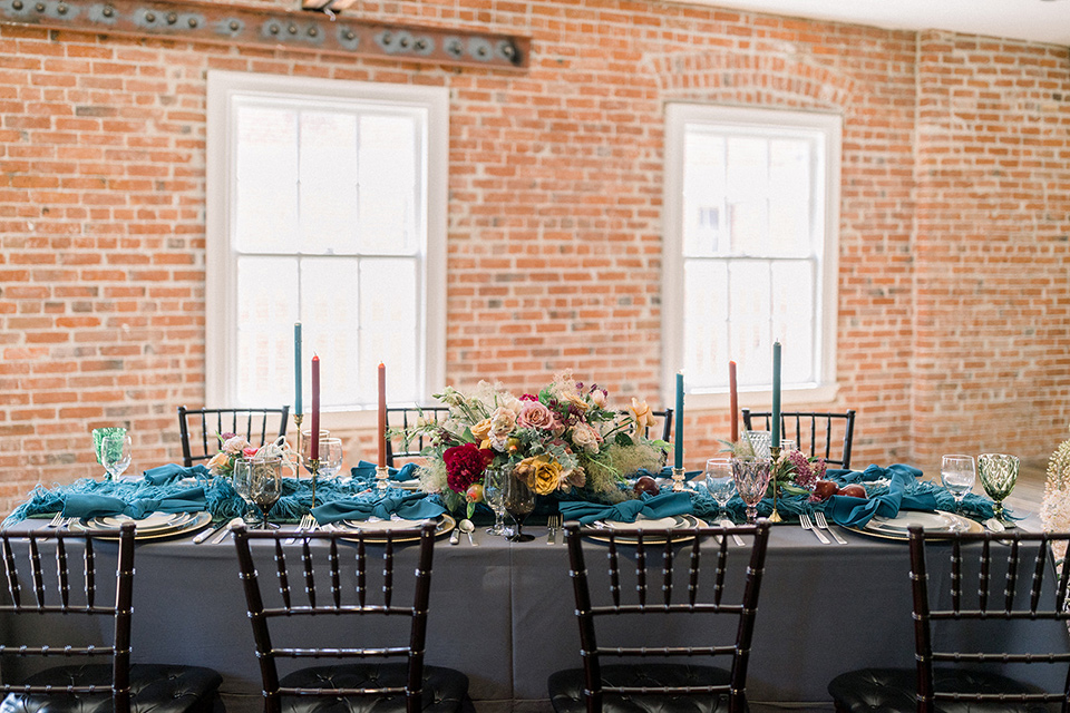  a burgundy and teal industrial winter wedding – reception table décor 