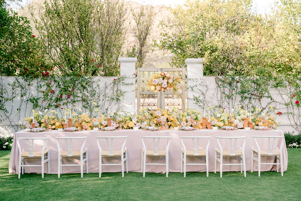  a golden toned wedding with garden details in Arizona - reception decor