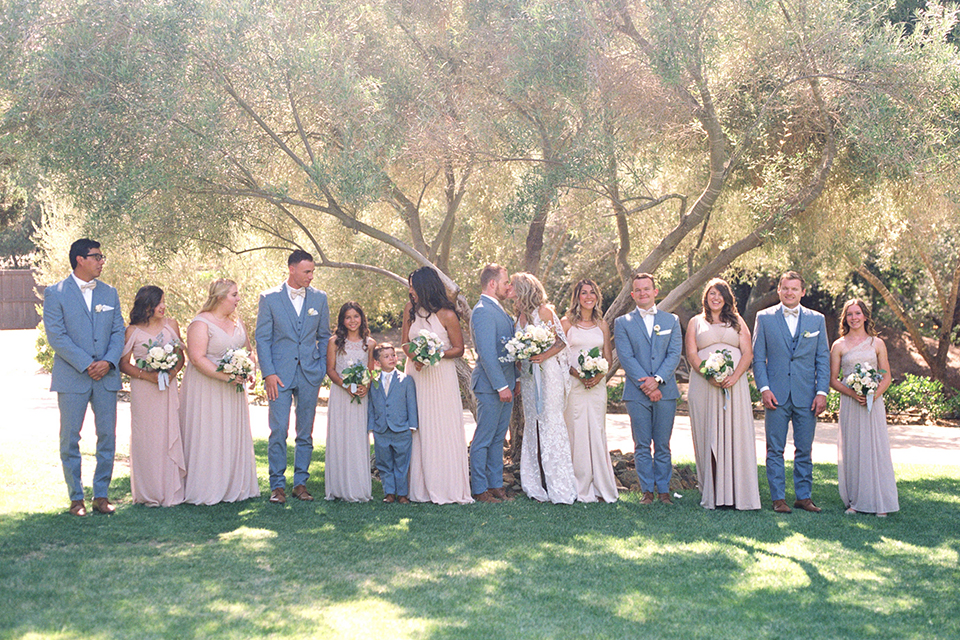  light blue and pink wedding with the groom in a light blue suit and the bride in a lace gown – bridalparty