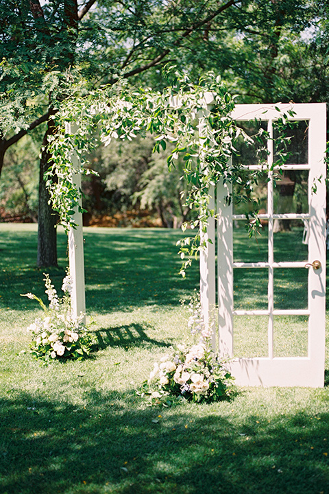  light blue and pink wedding with the groom in a light blue suit and the bride in a lace gown – reception décor 