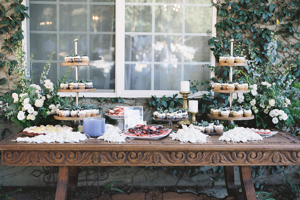  light blue and pink wedding with the groom in a light blue suit and the bride in a lace gown – dessert table 