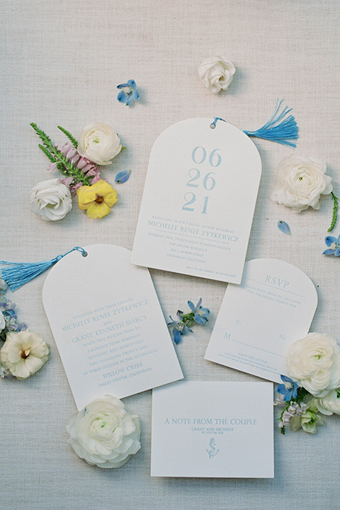  light blue and pink wedding with the groom in a light blue suit and the bride in a lace gown – invitations 