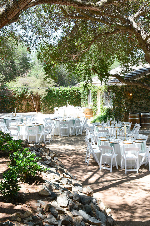  light blue and pink wedding with the groom in a light blue suit and the bride in a lace gown – reception décor 