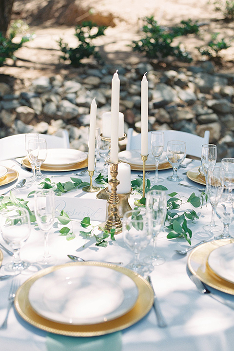  light blue and pink wedding with the groom in a light blue suit and the bride in a lace gown – table décor 