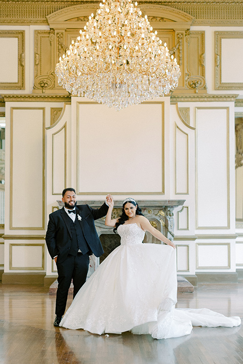  a royal black and rose grand wedding – couple dancing 