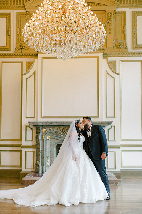  a royal black and rose grand wedding – couple dancing 