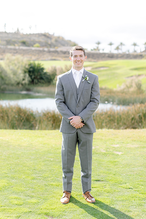  grey and dusty blue wedding with beachy touches - groom 
