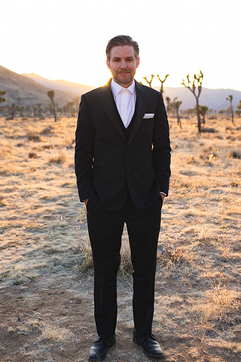  Joshua tree elopement with the bride in a sparkly gown and the groom in a black tuxedo – groom in tuxedo
