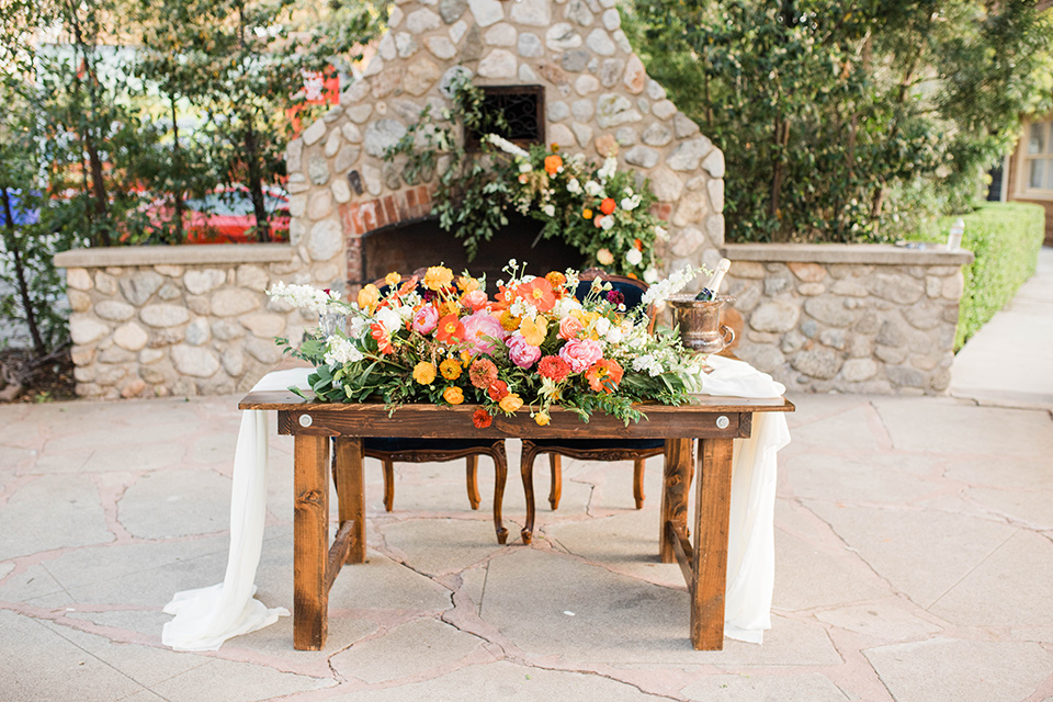  citrus blue and orange wedding with rustic tones – sweetheart table 