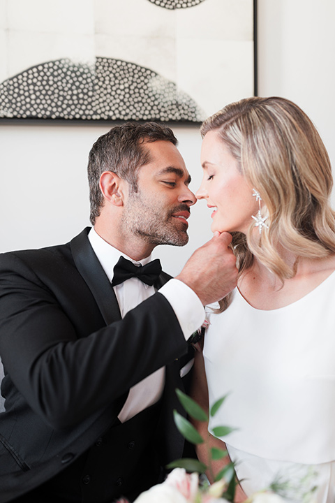  black and white wedding at the Laper Hotel – couple on the couch