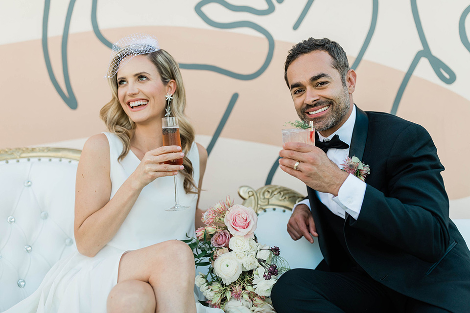  black and white wedding at the Laper Hotel – couple having cocktails