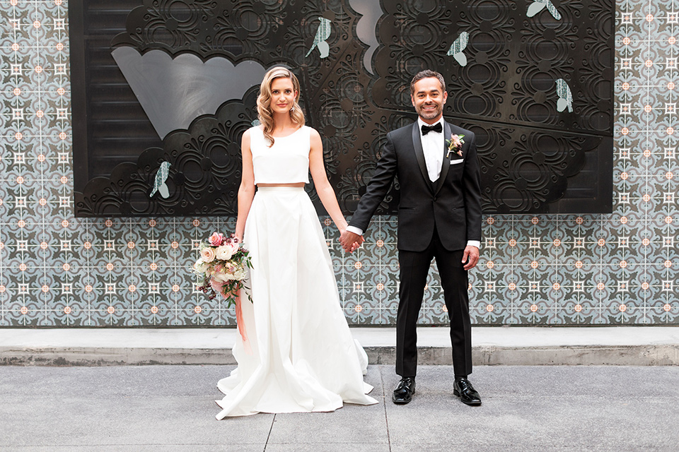  black and white wedding at the Laper Hotel – holding hands