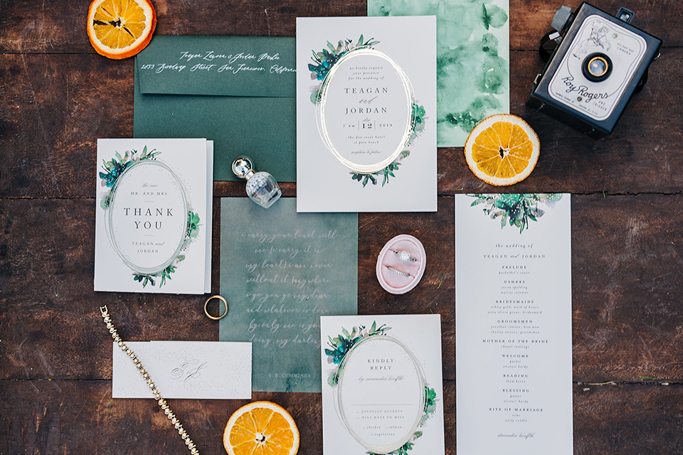  a greenery las vegas wedding at a rustic venue with the bride in an A-line gown and the groom in a green suit – invitations