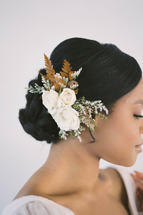  minimalistic nude wedding with vintage touches, the bride in a flowing gown with sleeves and the groom in a tan suit - bride