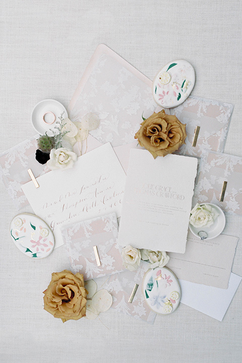  minimalistic nude wedding with vintage touches, the bride in a flowing gown with sleeves and the groom in a tan suit – invitations