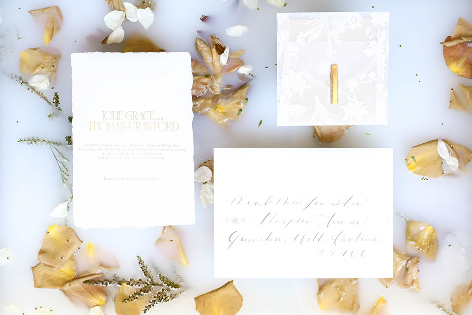  minimalistic nude wedding with vintage touches, the bride in a flowing gown with sleeves and the groom in a tan suit – invitations