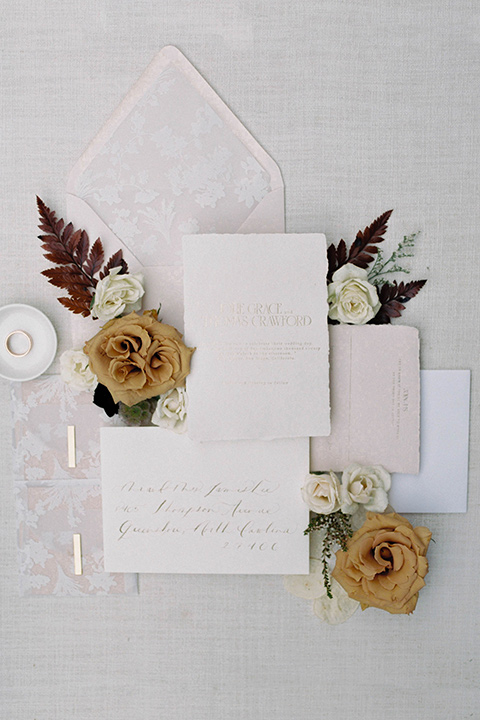  minimalistic nude wedding with vintage touches, the bride in a flowing gown with sleeves and the groom in a tan suit – invitations 