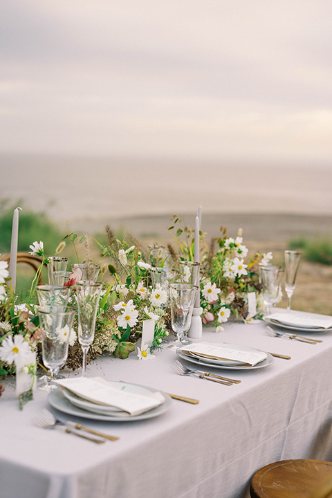 modern black and white upscale wedding on the cliffs overlooking the ocean – table décor 