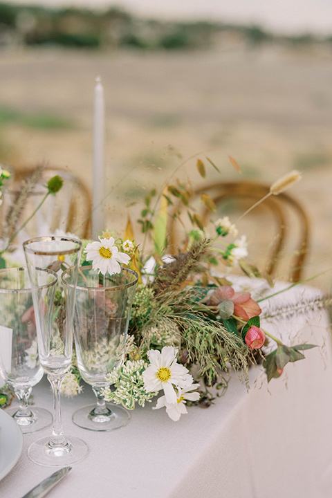  modern black and white upscale wedding on the cliffs overlooking the ocean –  table décor 