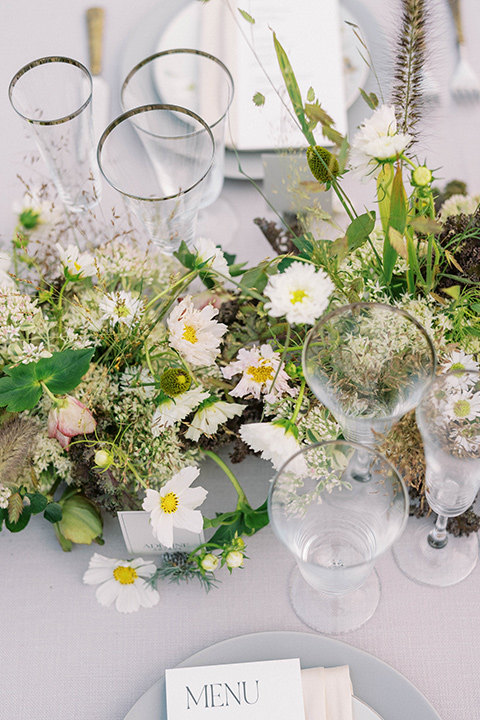  modern black and white upscale wedding on the cliffs overlooking the ocean –  table décor 