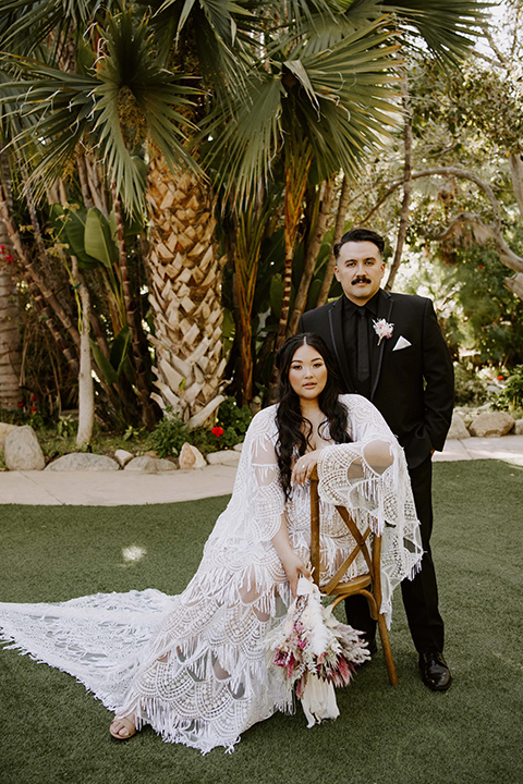  black and white wedding design at the Maxwell House with touches of pink – couple at reception 