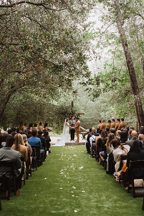  a neutral monochromatic earth toned wedding with boho trendy vibes - ceremony 