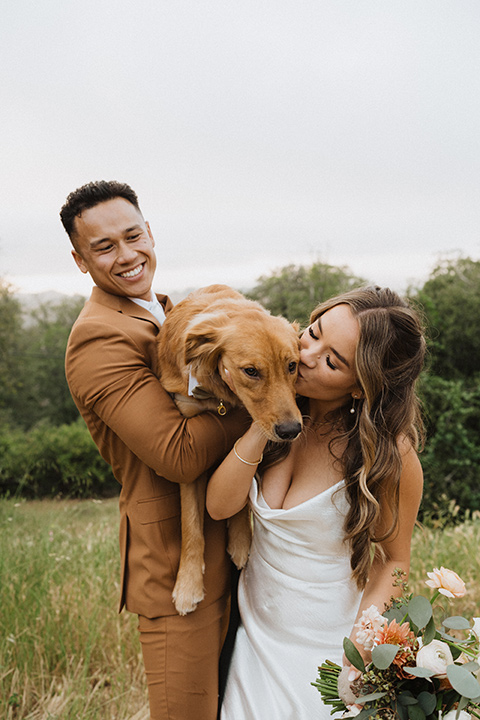  a neutral monochromatic earth toned wedding with boho trendy vibes - couple with dog 