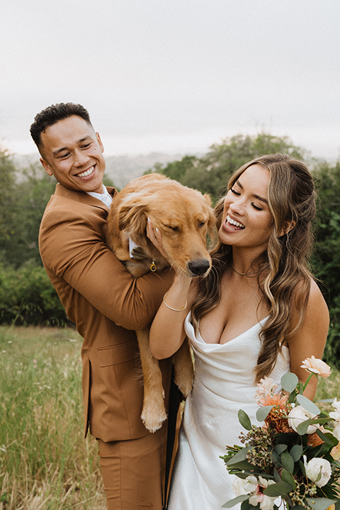  a neutral monochromatic earth toned wedding with boho trendy vibes - couple with dog 