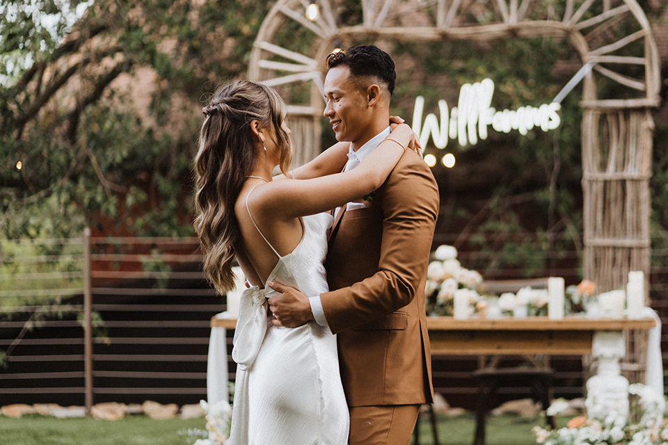  a neutral monochromatic earth toned wedding with boho trendy vibes - first dance 