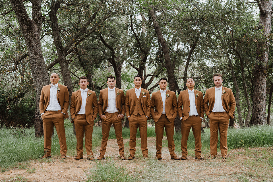  a neutral monochromatic earth toned wedding with boho trendy vibes - groomsmen 