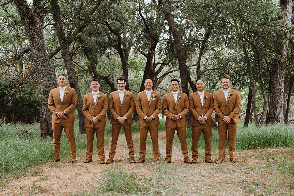  a neutral monochromatic earth toned wedding with boho trendy vibes - groomsmen 